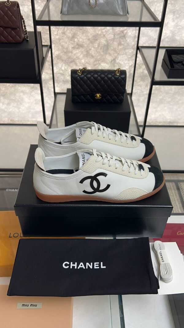 Chanel Calfskin Embossed Suede Sneakers  White Black