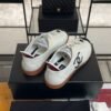 Chanel Calfskin Embossed Suede Sneakers  White Black