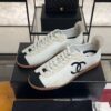 Chanel Calfskin Embossed Suede Sneakers  White Black