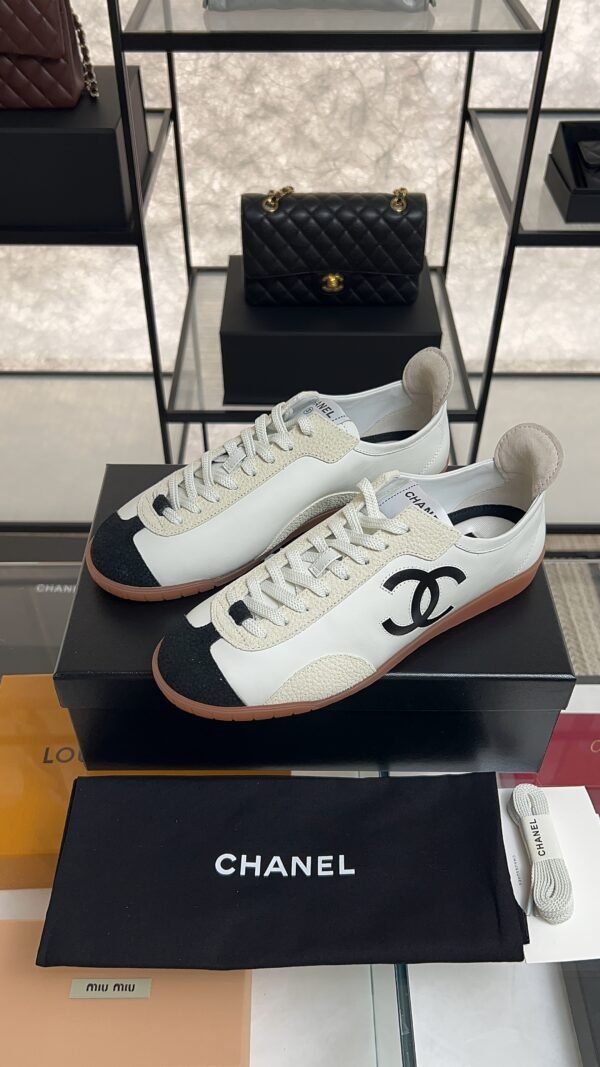 Chanel Calfskin Embossed Suede Sneakers  White Black
