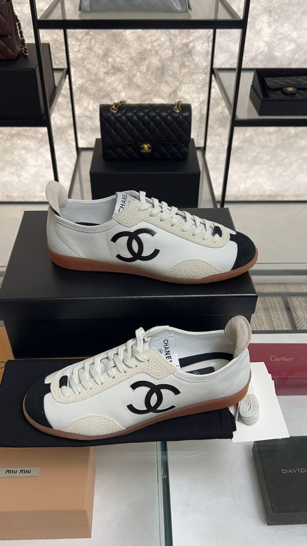 Chanel Calfskin Embossed Suede Sneakers  White Black
