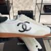 Chanel Calfskin Embossed Suede Sneakers  White Black