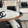 Chanel Calfskin Embossed Suede Sneakers  White Black