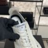 Chanel Calfskin Embossed Suede Sneakers  White Black