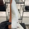 Chanel Calfskin Embossed Suede Sneakers  White Black