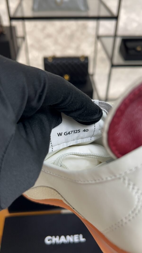 Chanel Calfskin Embossed Suede Sneakers  White Black
